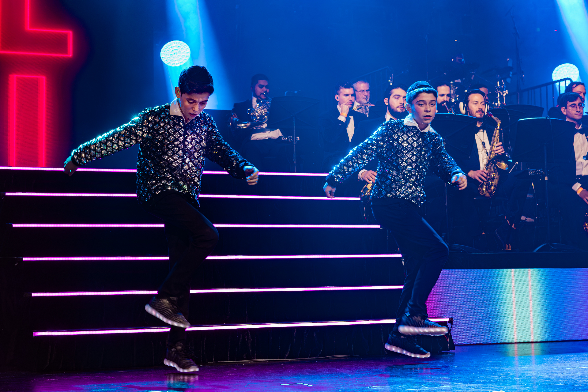 Stage performance under spotlights